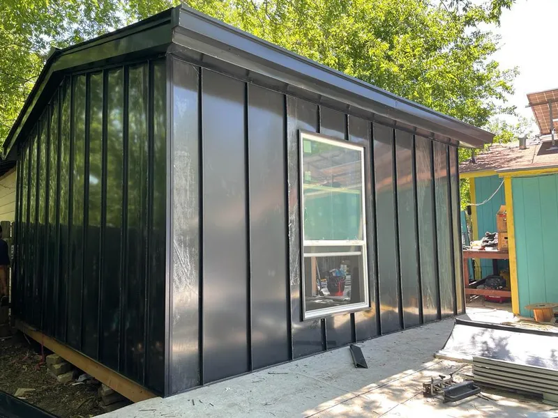 Black standing seam metal wall panels for Roof Inspection in Gilmer