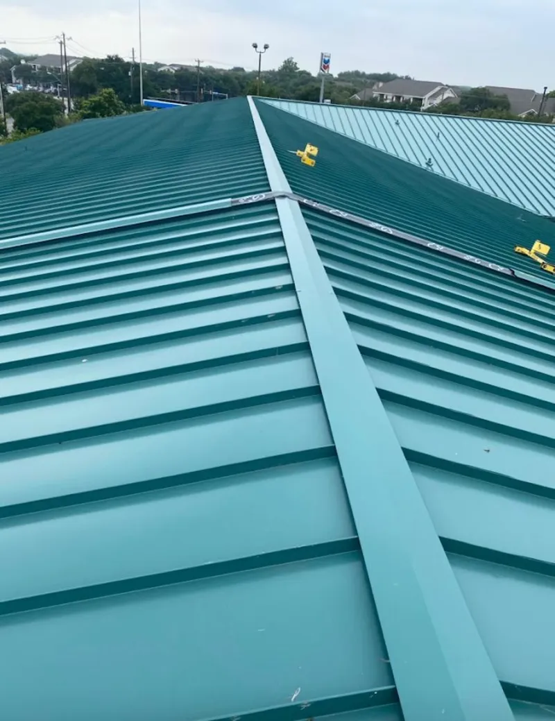 Green commercial metal roof ridge and valley for Metal Roof Repair in Gilmer
